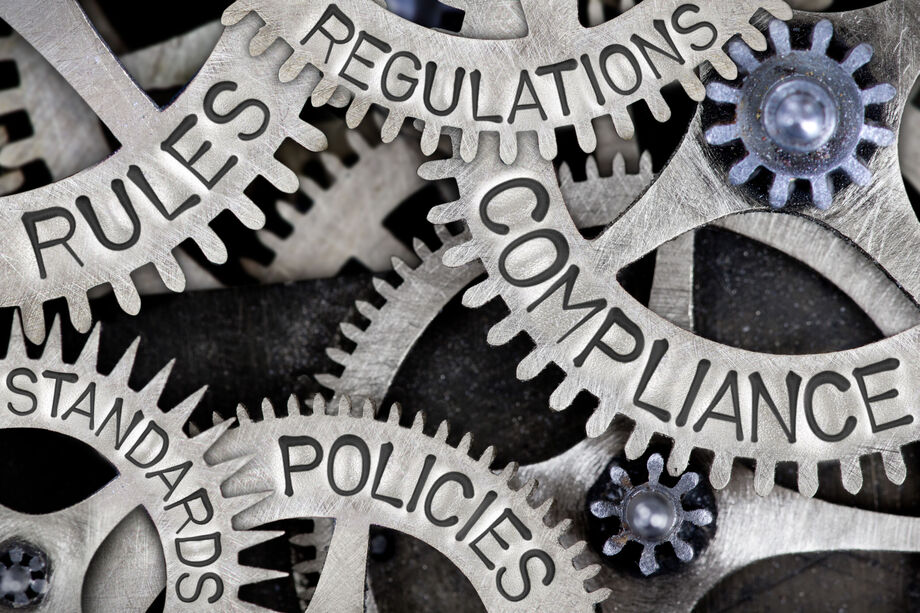 Cogs with the wording, regulations, legislation, policies, compliance